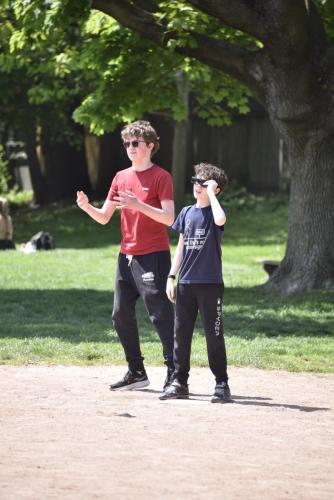 Two students hiding from the sun